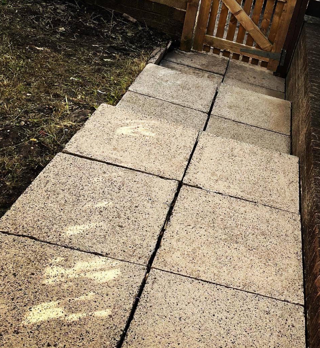 Paving slabs cleaned back to bare stone by J.M Jet Wash
